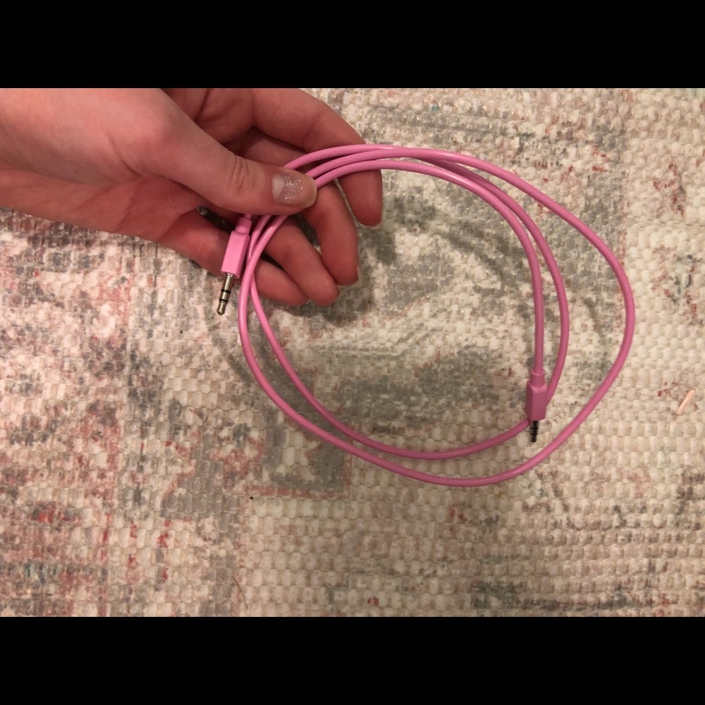A pink aux cord